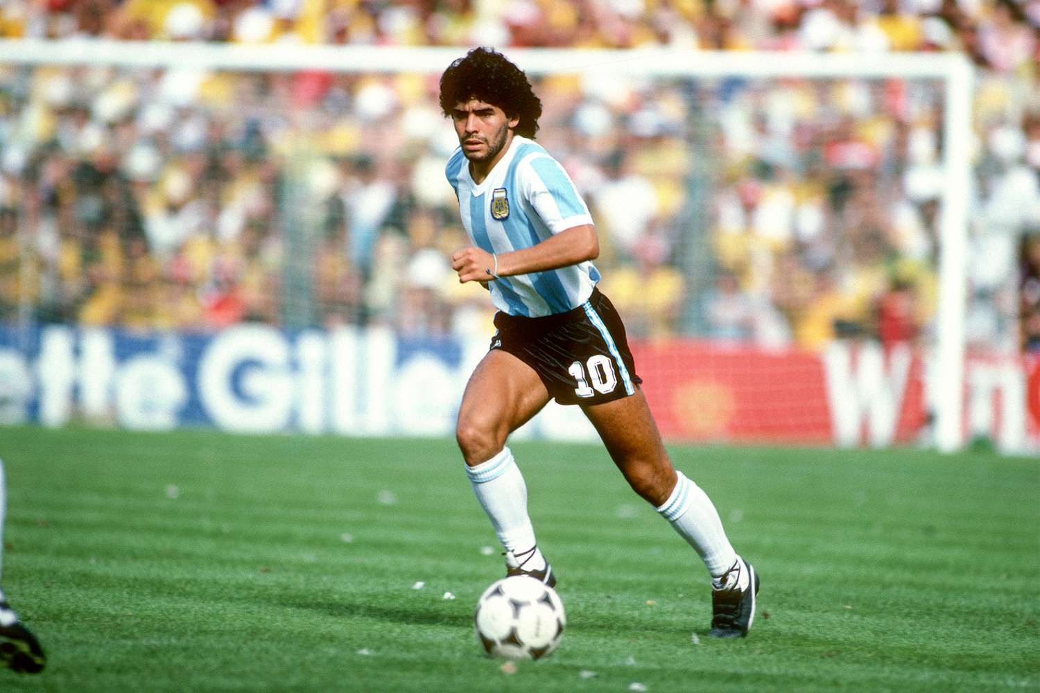 Maradona wearing an argentina retro football shirt - retro soccer jersey