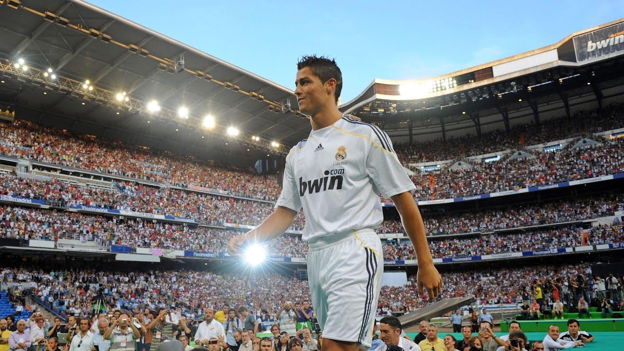 Cristiano Ronaldo Wearing Real Madrid football shirt for the first time at his presentation in the bernabeu